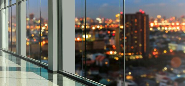 Office Glass Windows City View at Sunset